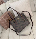 BOLSO COACH CAFÉ