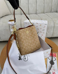 BOLSO COACH BEIGE